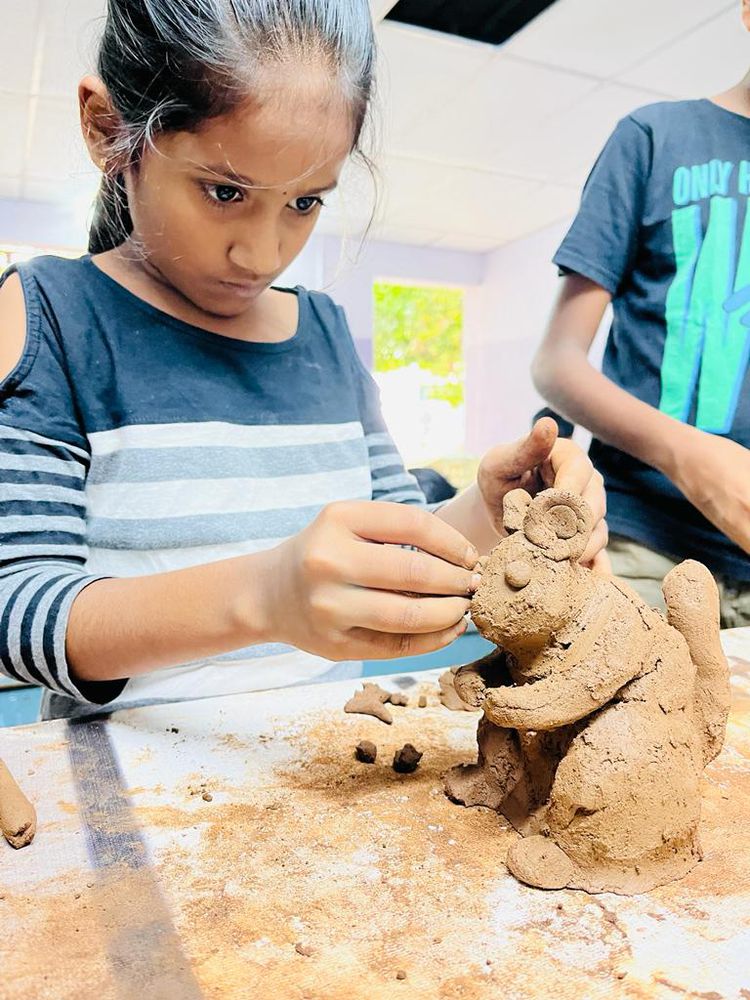 Children of all ages learning together at Mango Woods School