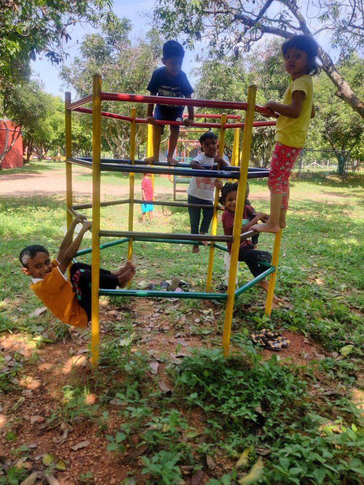 Children of all ages learning together at Mango Woods School