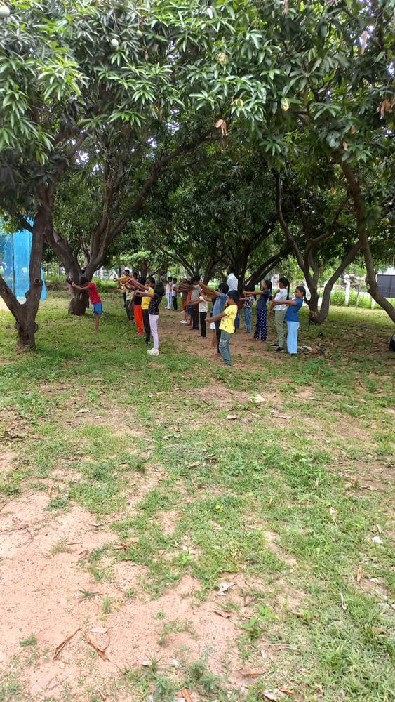 Children of all ages learning together at Mango Woods School