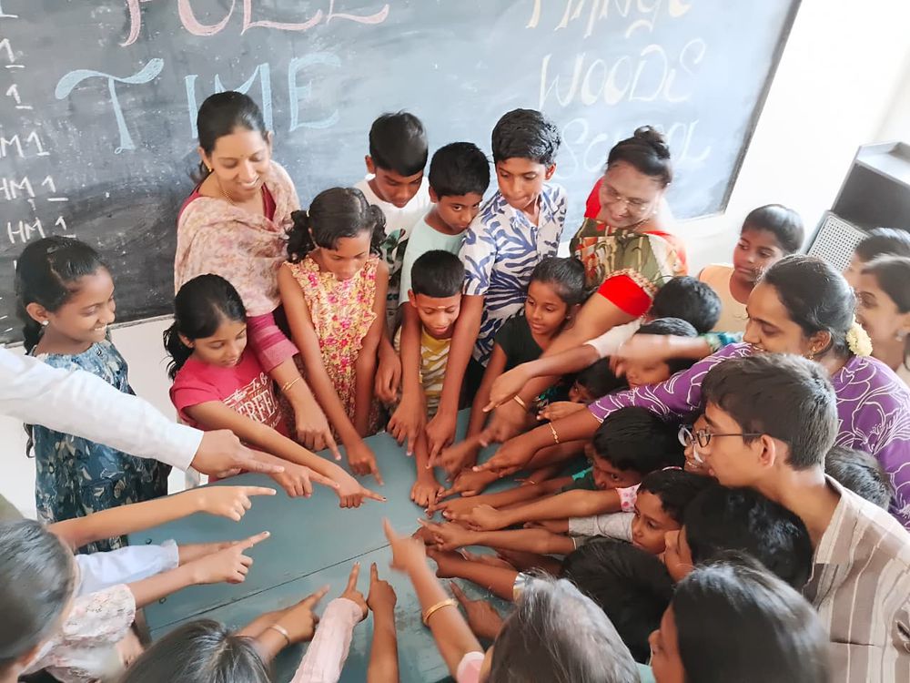Children of all ages learning together at Mango Woods School