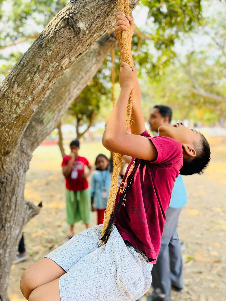Children of all ages learning together at Mango Woods School