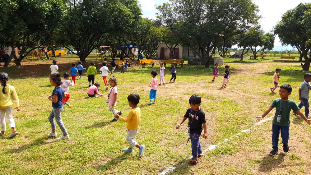 Children of all ages learning together at Mango Woods School
