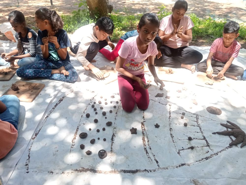 Children of all ages learning together at Mango Woods School