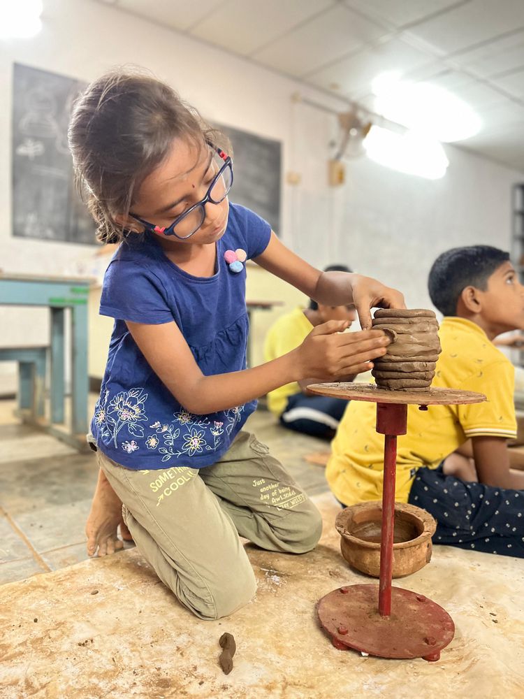 Children of all ages learning together at Mango Woods School
